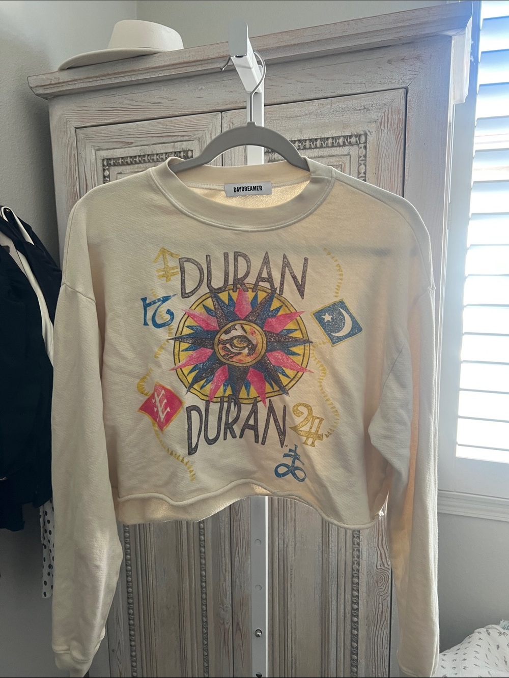 Daydreamer Cream Cropped Duran Duran Graphic Sweatshirt with Multicolor Sun